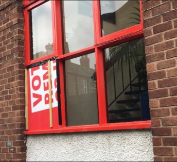 boarded-up-stairwell-widow