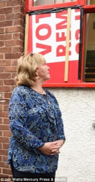councillor-bernie-mooney-in-front-of-stairwell-window